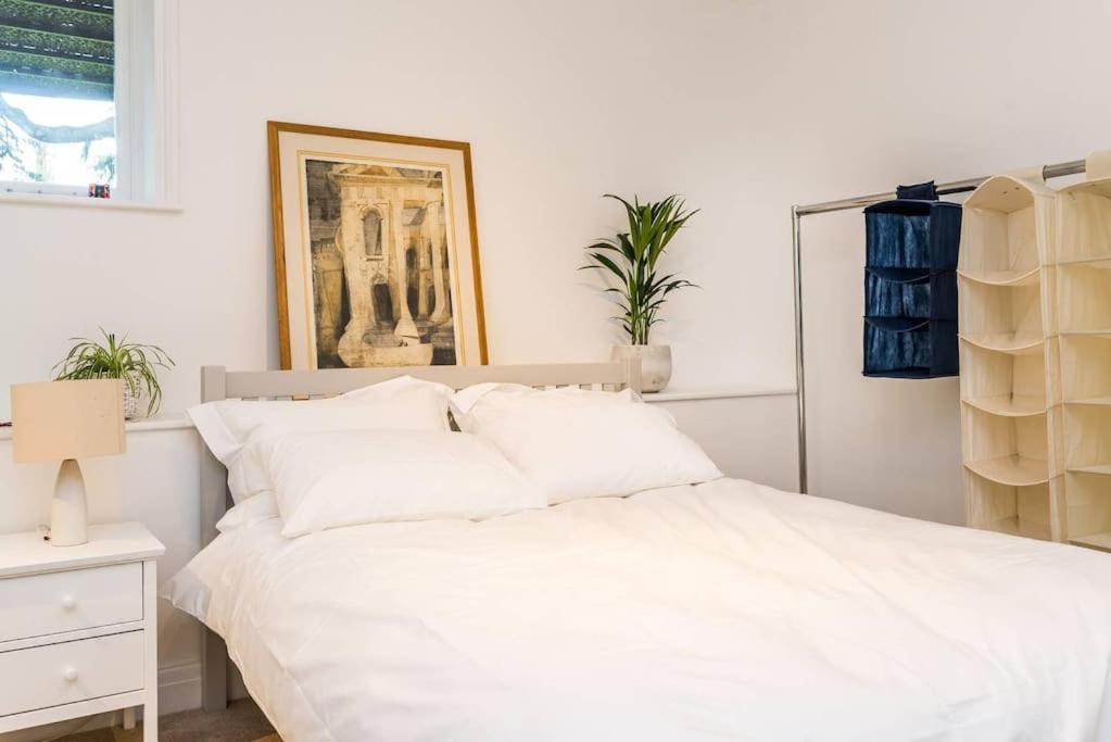 Elegant 2-Bedroom Getaway w Terrace & Garden Views