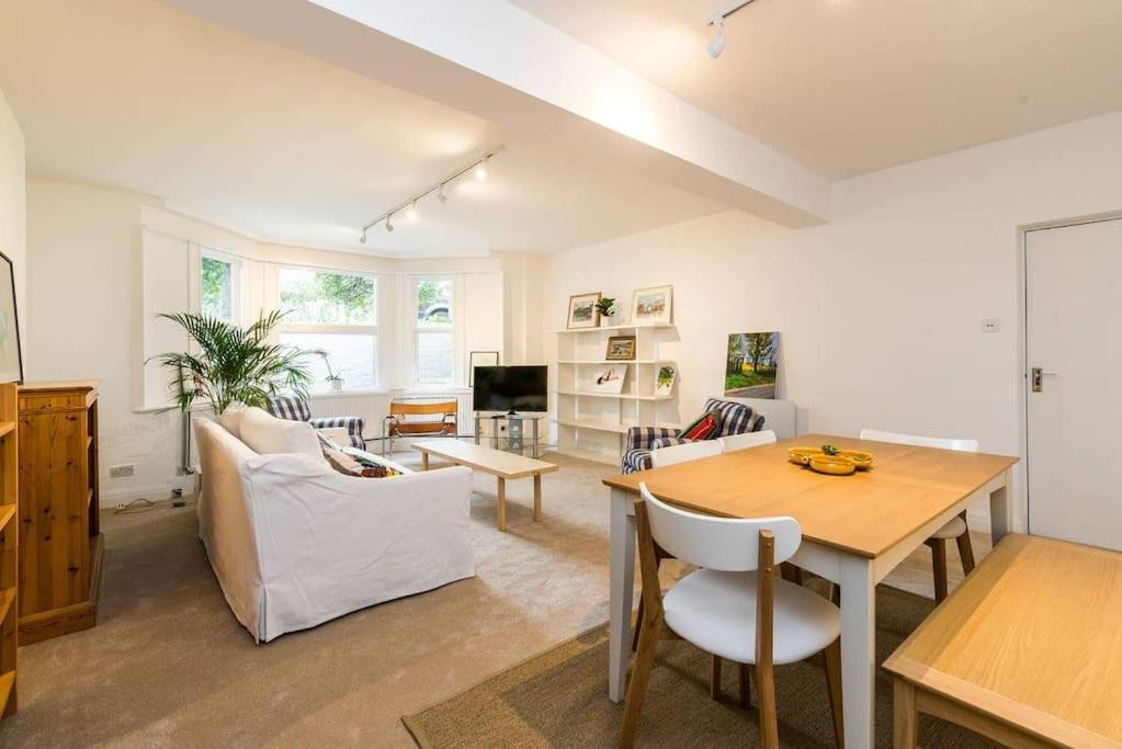 Elegant 2-Bedroom Getaway w Terrace & Garden Views