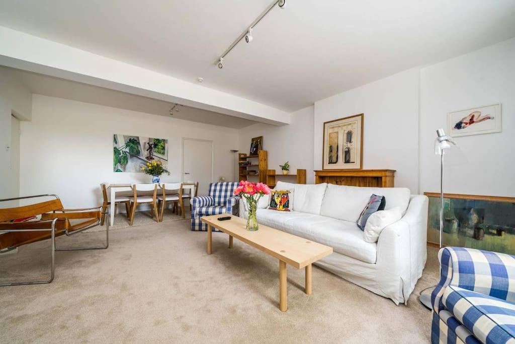 Elegant 2-Bedroom Getaway w Terrace & Garden Views