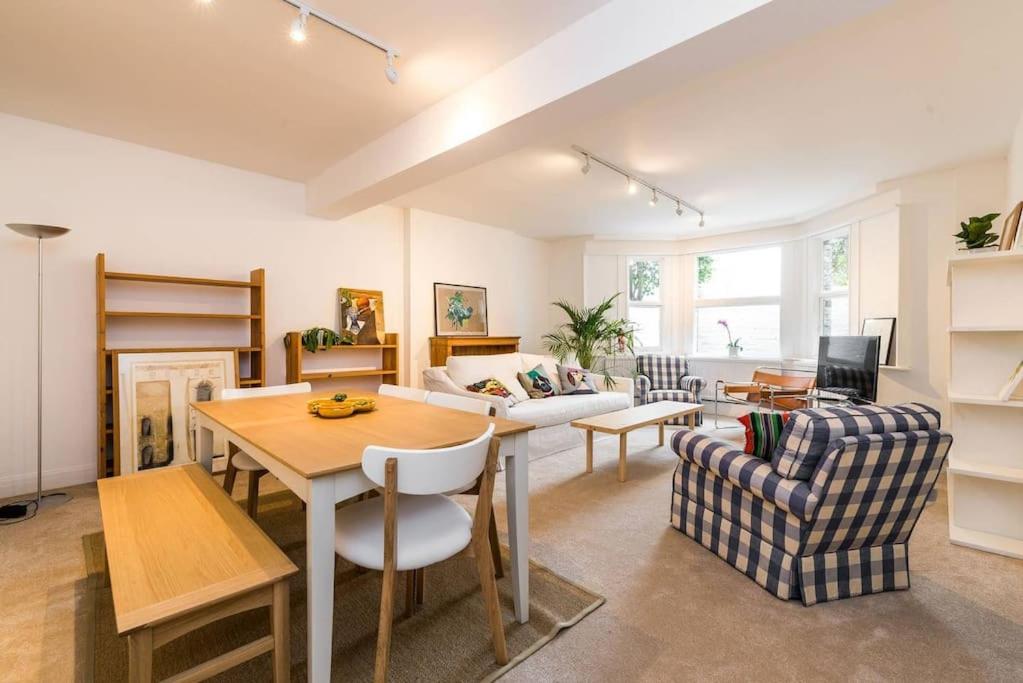 Elegant 2-Bedroom Getaway w Terrace & Garden Views