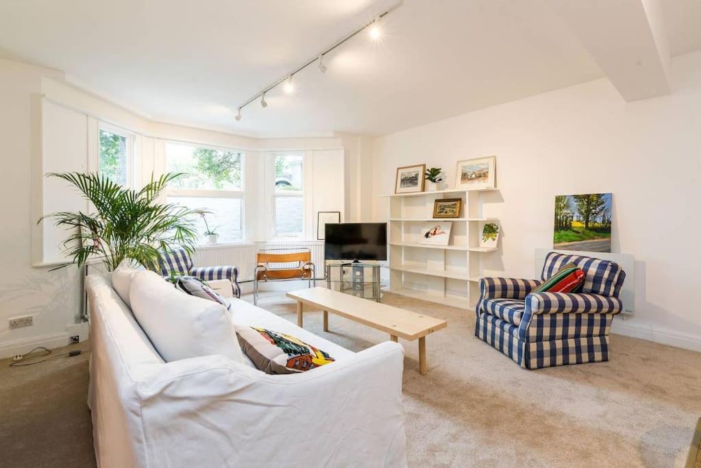 Elegant 2-Bedroom Getaway w Terrace & Garden Views
