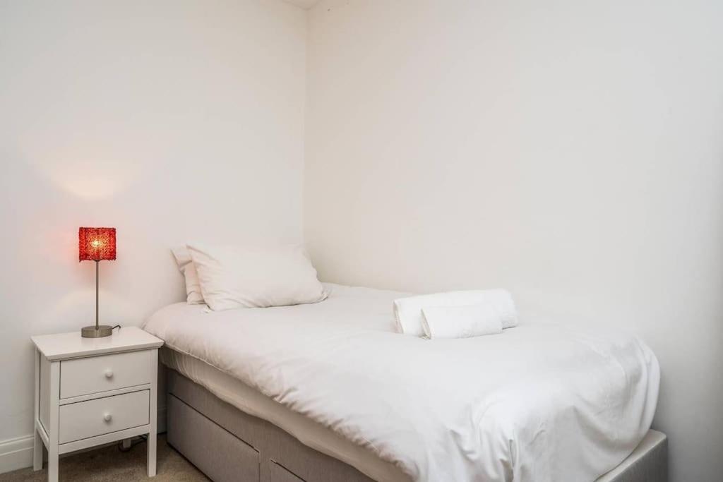 Elegant 2-Bedroom Getaway w Terrace & Garden Views
