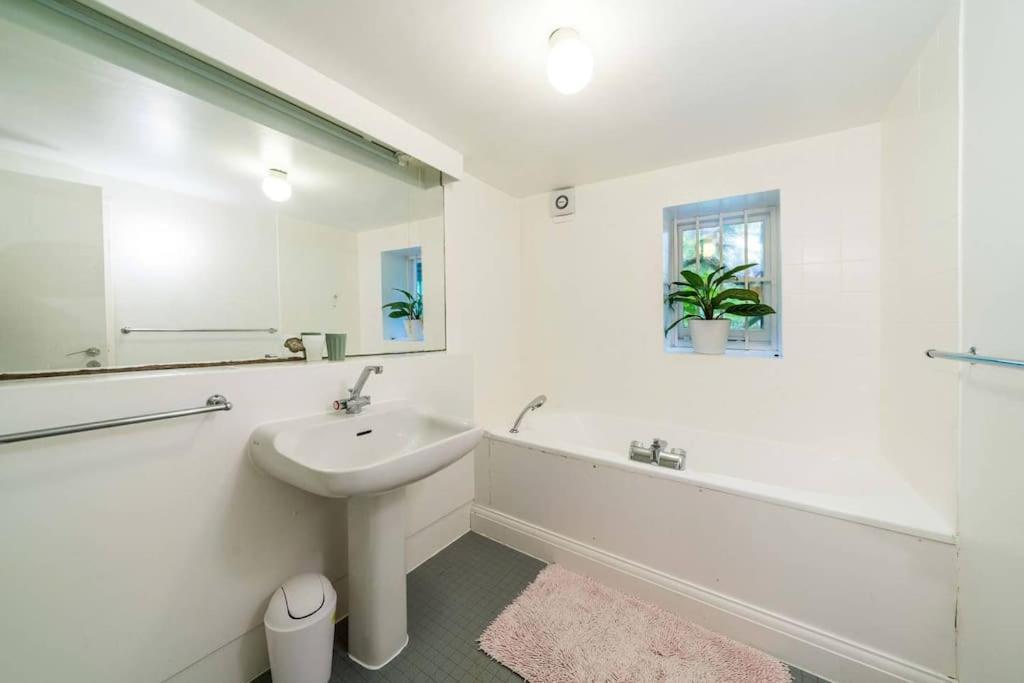 Elegant 2-Bedroom Getaway w Terrace & Garden Views