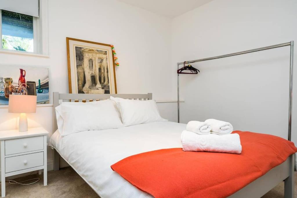 Elegant 2-Bedroom Getaway w Terrace & Garden Views