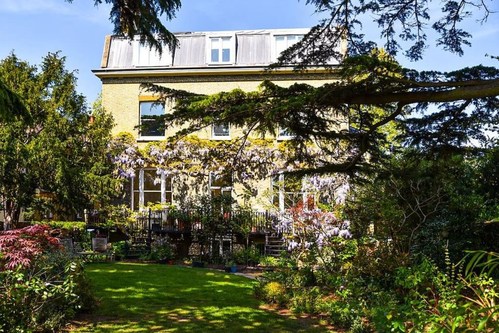 Elegant 2-Bedroom Getaway w Terrace & Garden Views