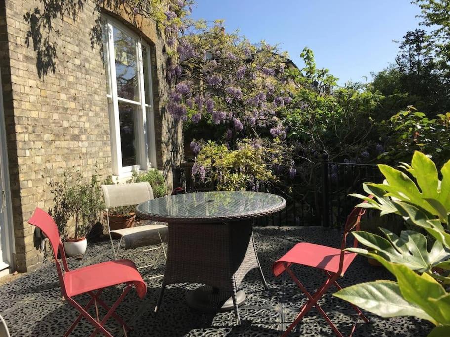 Elegant 2-Bedroom Getaway w Terrace & Garden Views