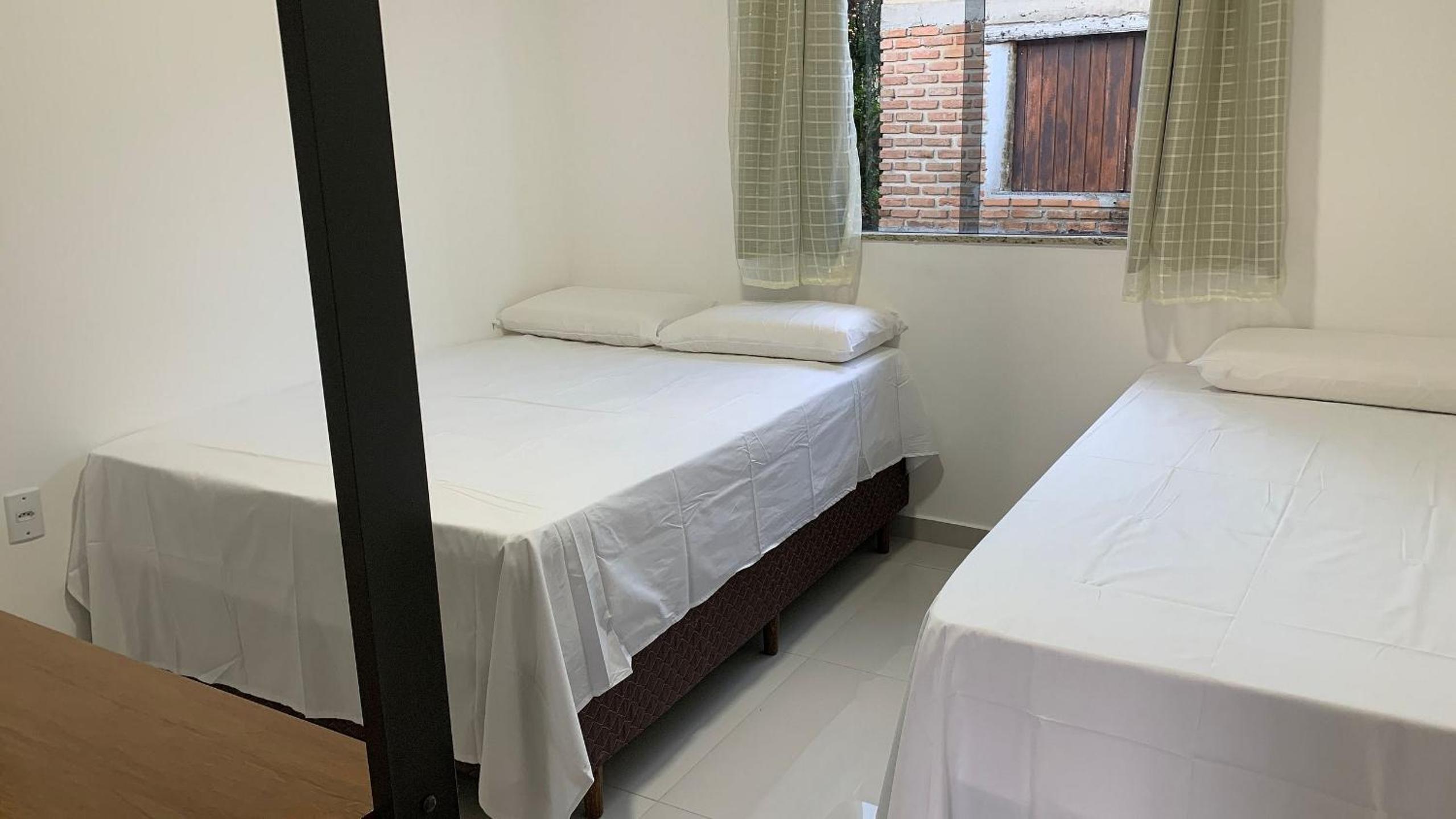 Quarto duplo na orla de Porto Bahia