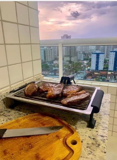 Apê canto do forte,próx praia,centro,garagem,Port 24hs,streaming e Wi-Fi grátis