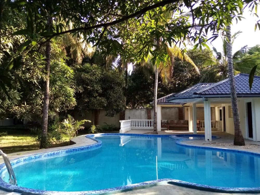 LeoMar 2 Diani Beach Ferienhaus mit grossen tropischen Garten und Pool