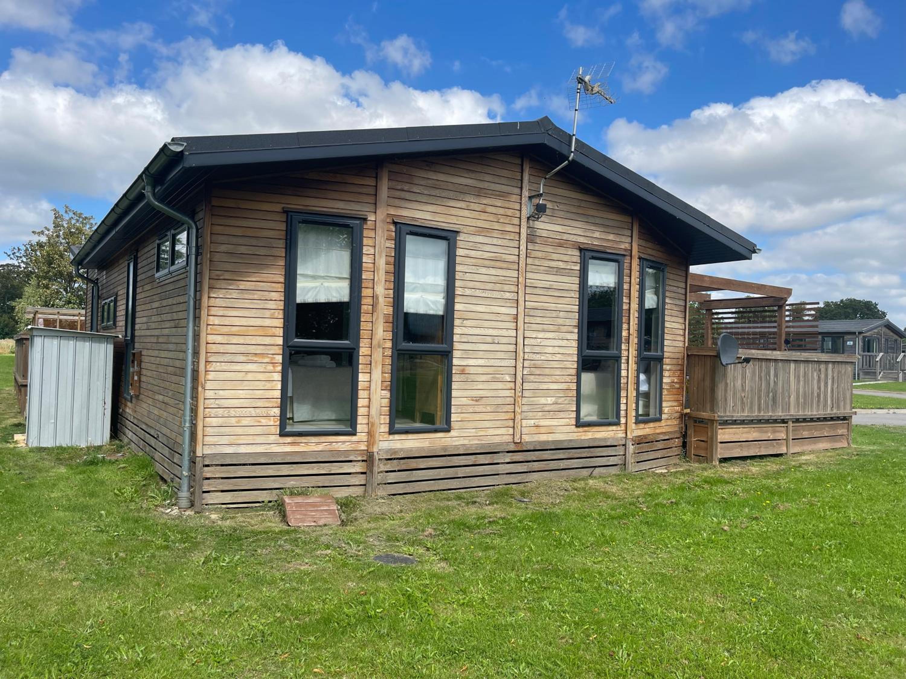 Glasshouse hot tub lodge