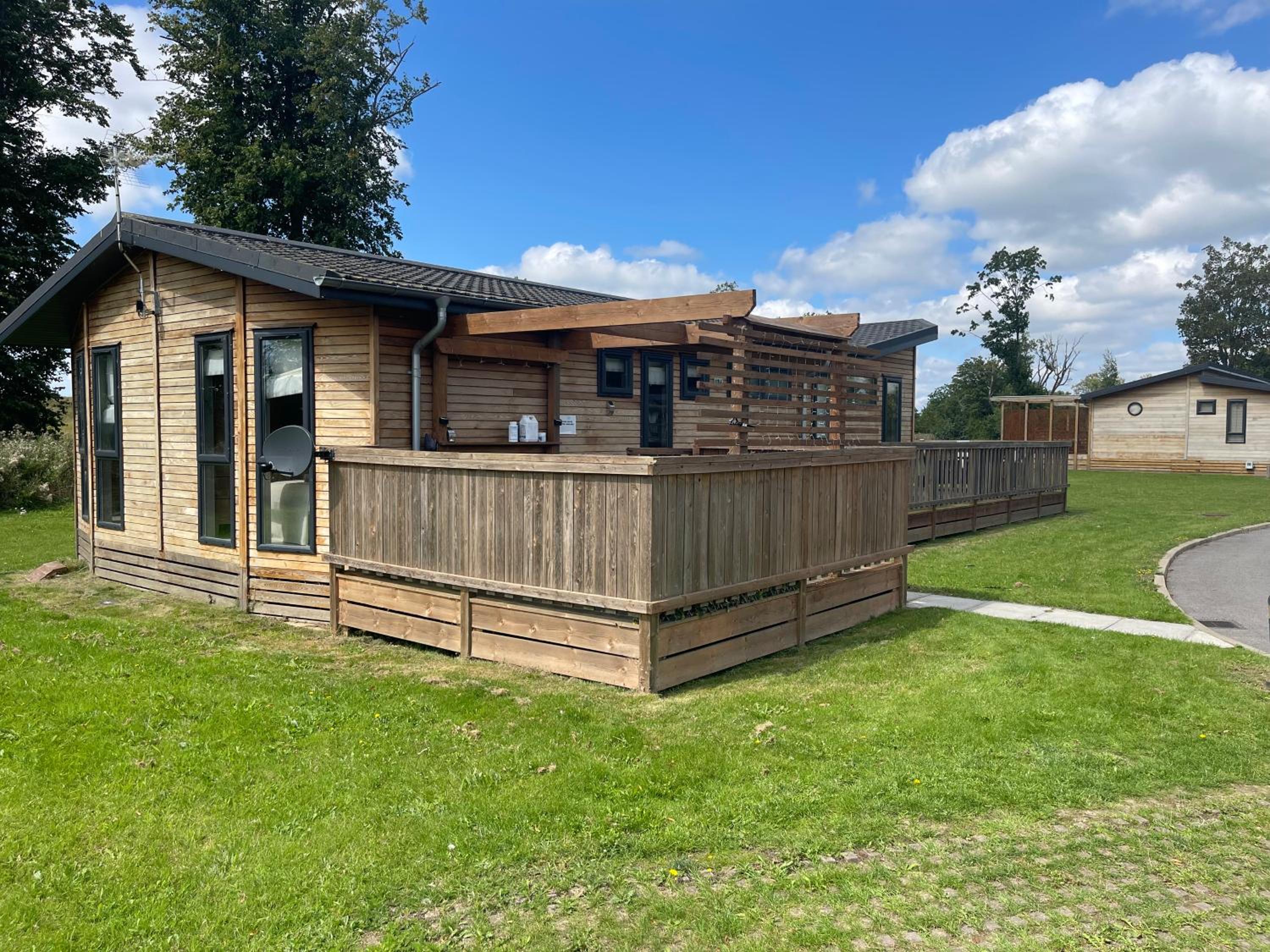Glasshouse hot tub lodge