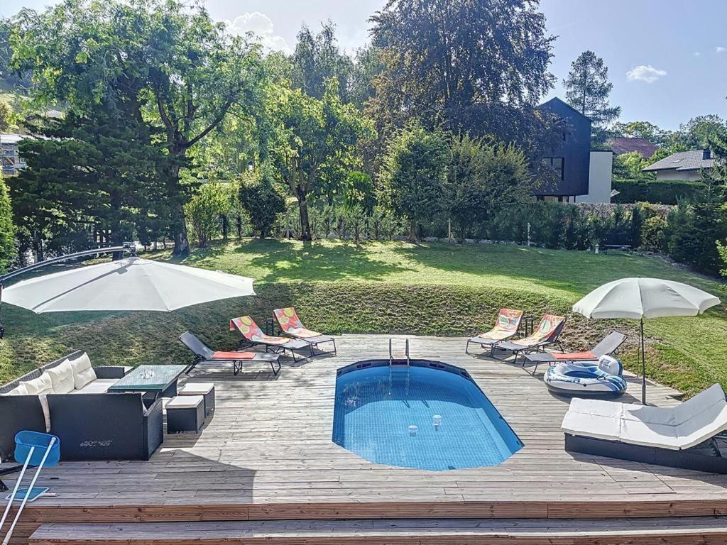 Appartement moderne avec terrasse et piscine à Châtel sur Bex