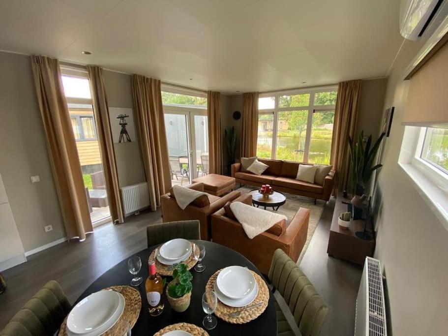 Kindvriendelijk luxe chalet in de bossen met privé sauna view 5