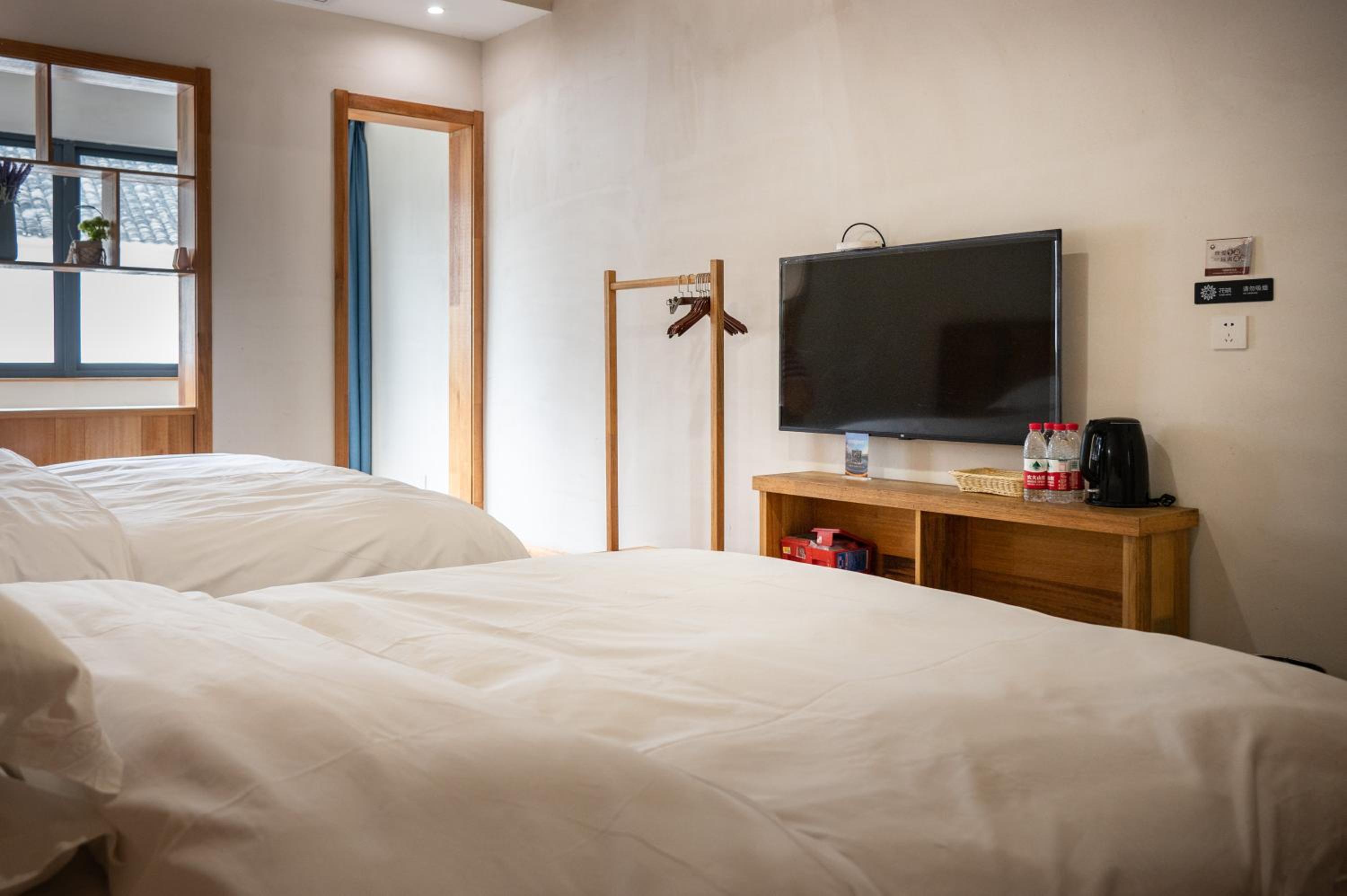 Tingjian Musu Private Soup Design Homestay - South Gate of Wuzhen Xizha Scenic Area