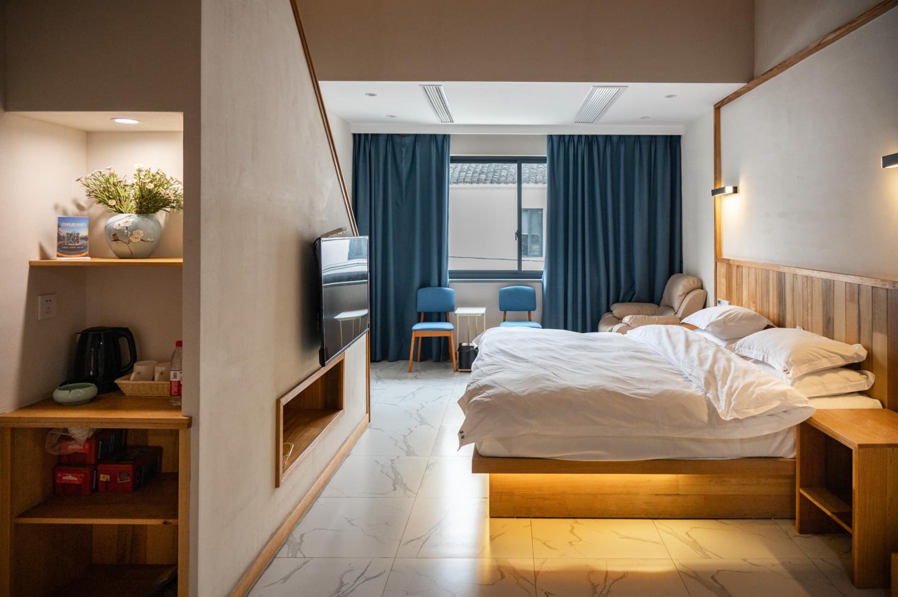 Tingjian Musu Private Soup Design Homestay - South Gate of Wuzhen Xizha Scenic Area