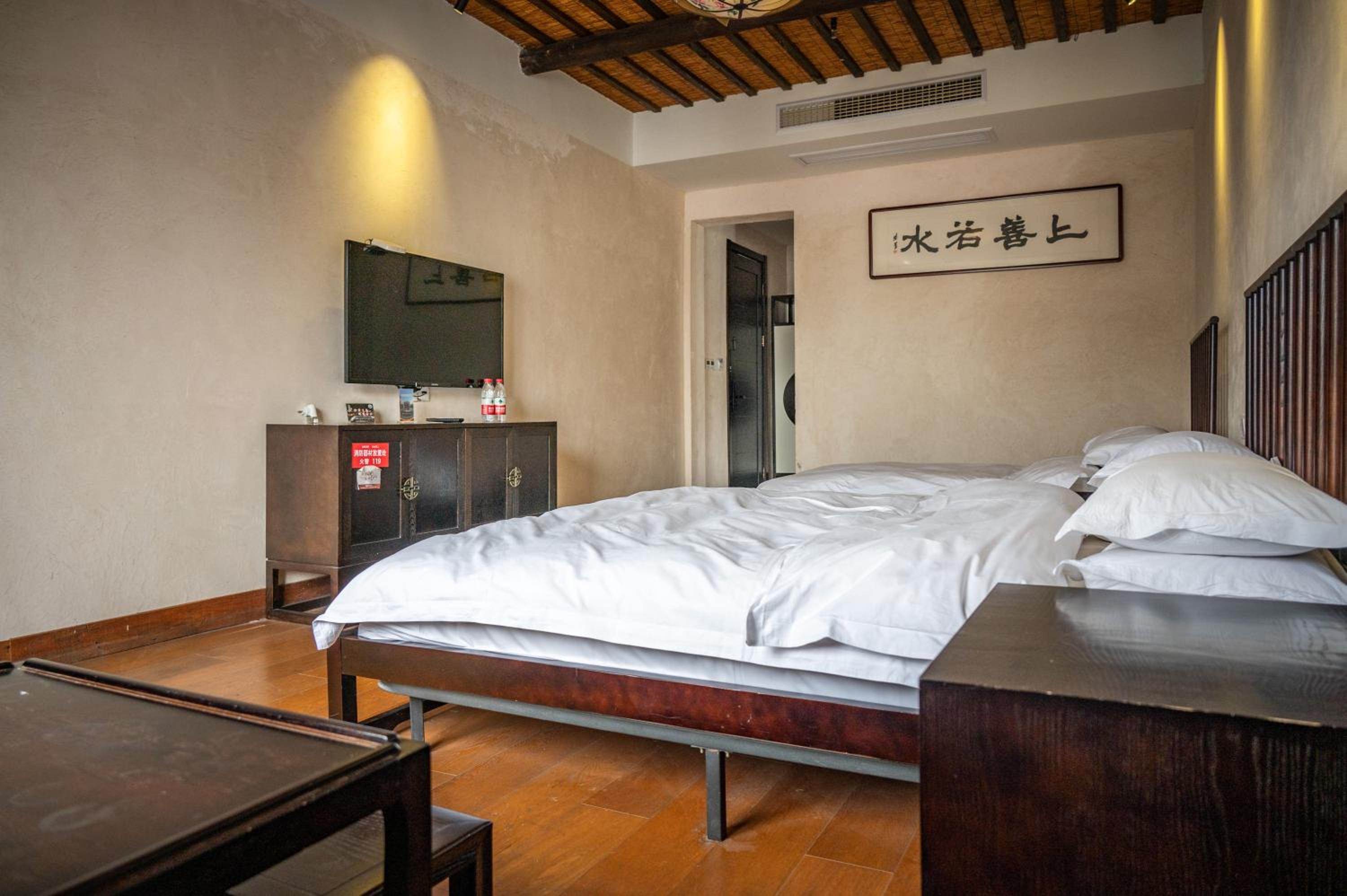 Tingjian Musu Private Soup Design Homestay - South Gate of Wuzhen Xizha Scenic Area