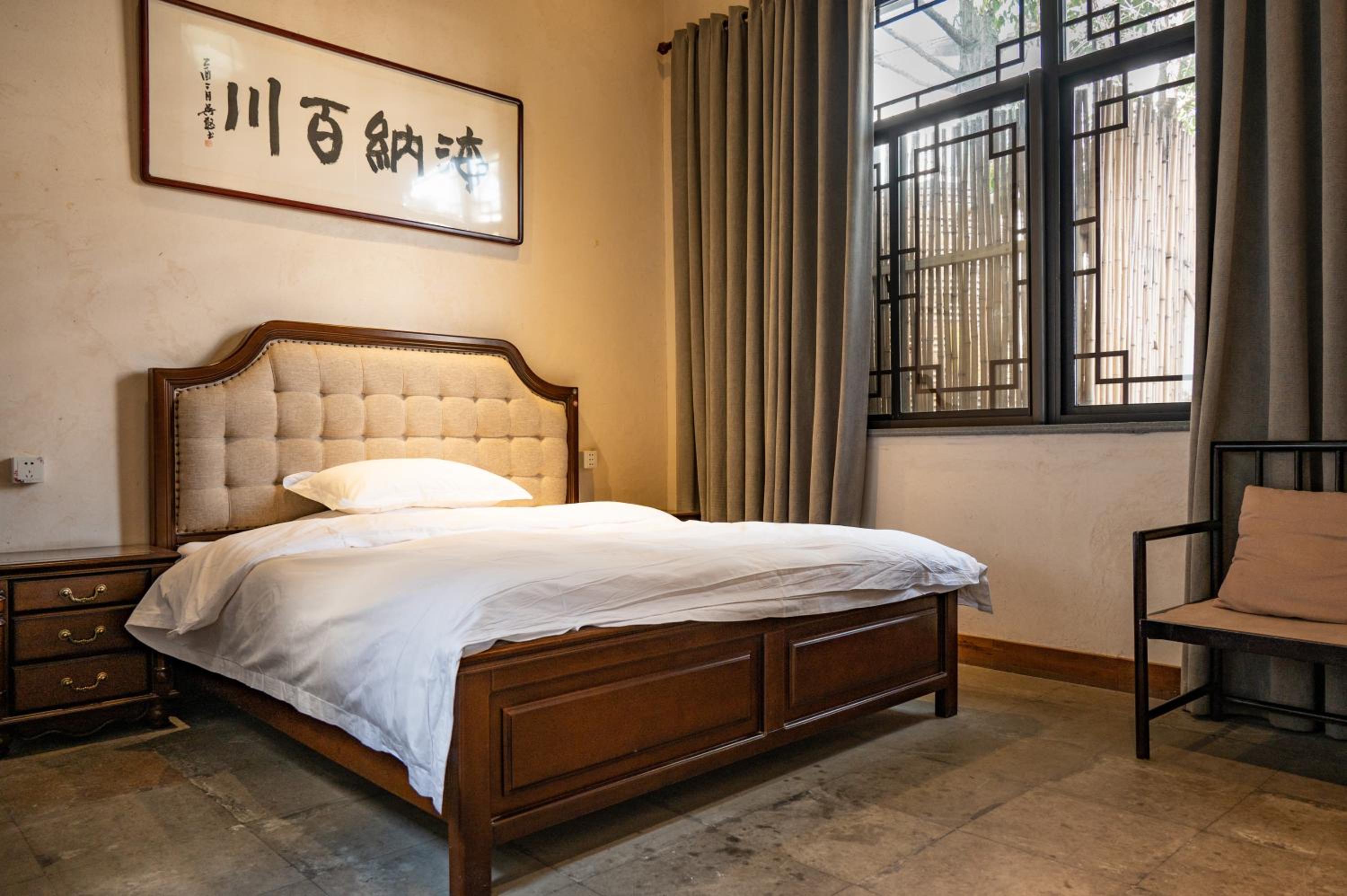 Tingjian Musu Private Soup Design Homestay - South Gate of Wuzhen Xizha Scenic Area