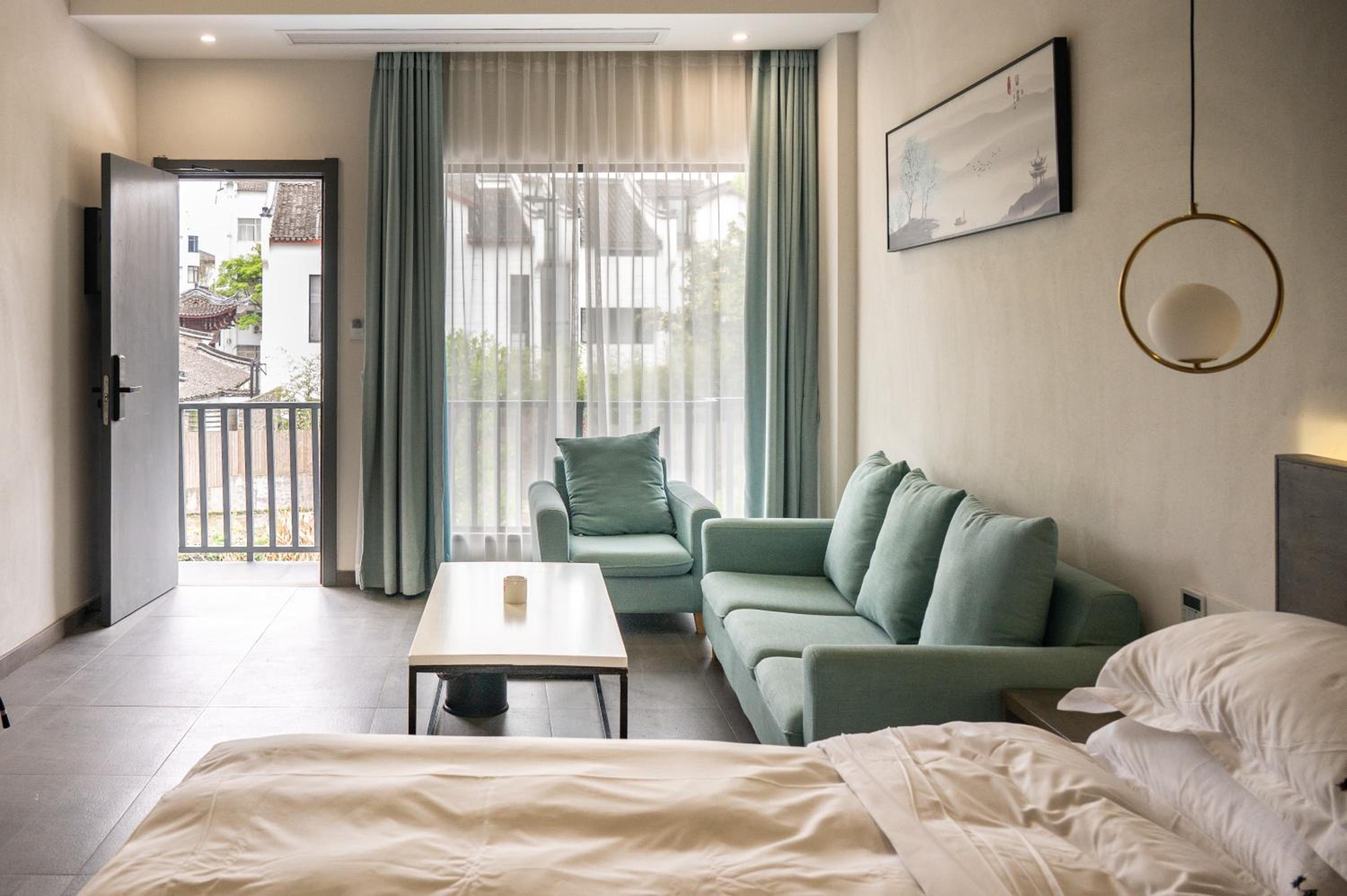 Tingjian Musu Private Soup Design Homestay - South Gate of Wuzhen Xizha Scenic Area