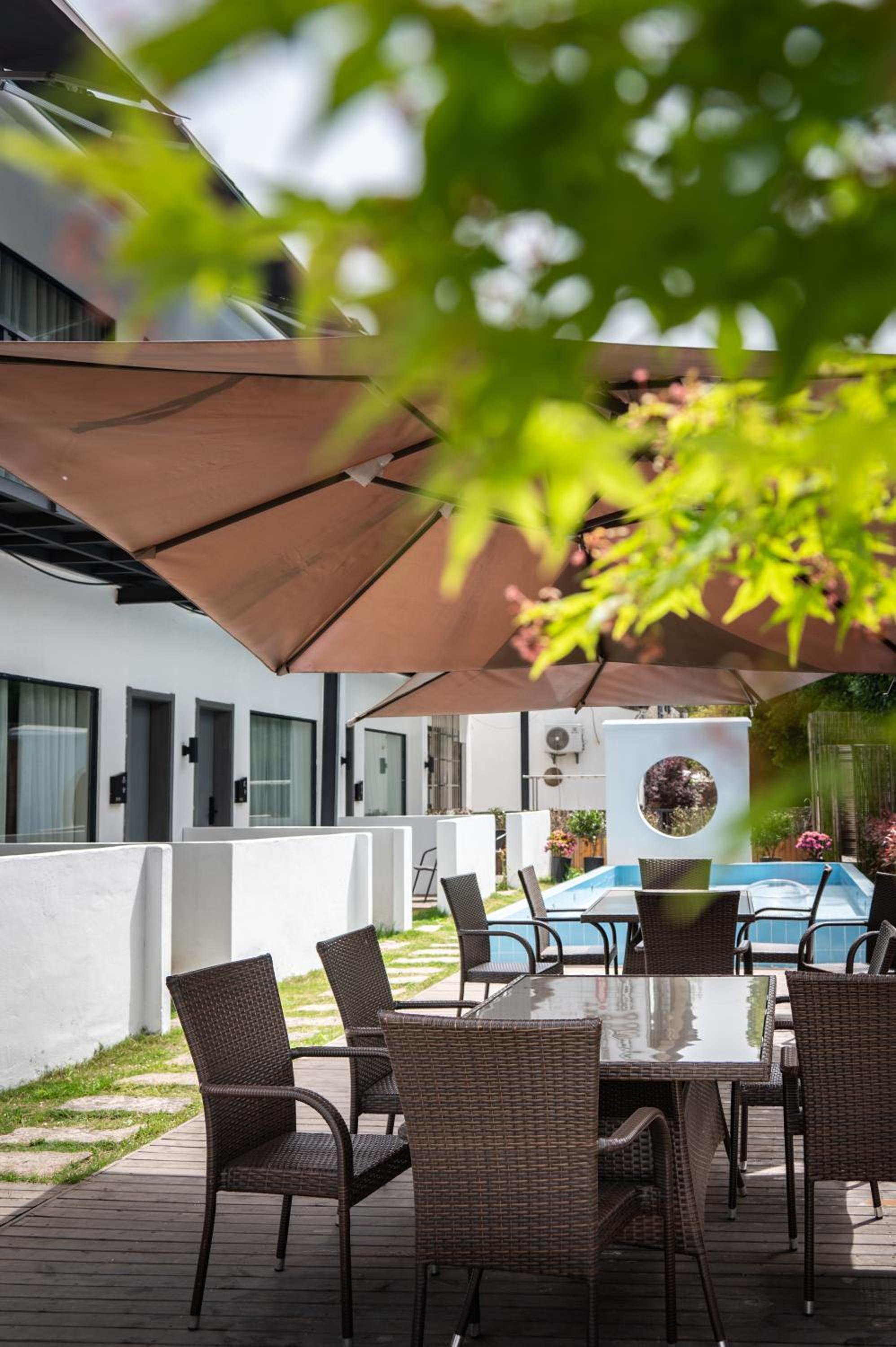 Tingjian Musu Private Soup Design Homestay - South Gate of Wuzhen Xizha Scenic Area