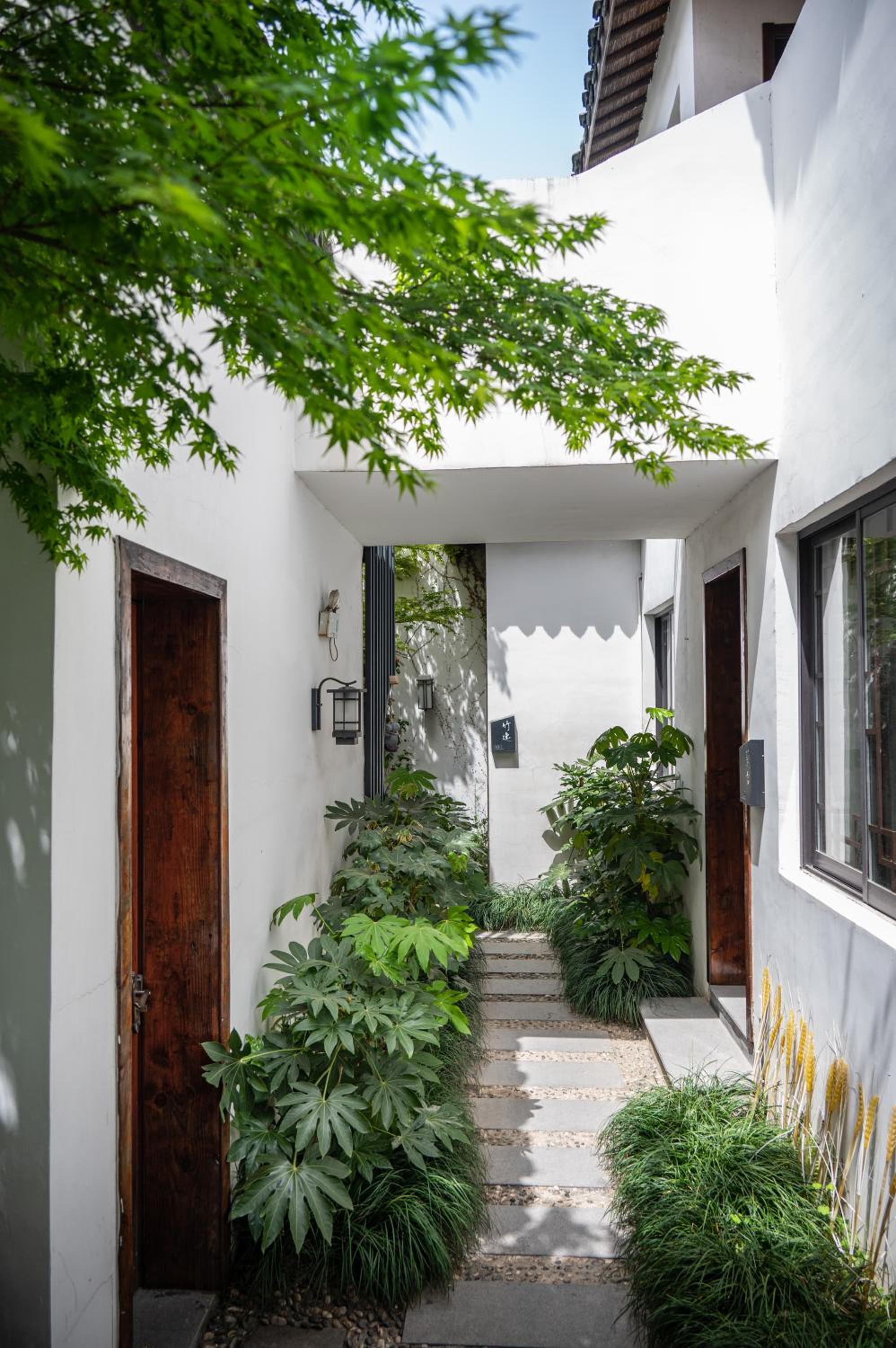 Tingjian Musu Private Soup Design Homestay - South Gate of Wuzhen Xizha Scenic Area