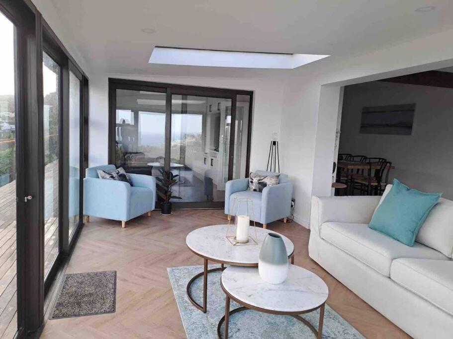 Modern mountainside home with ocean view - Minimal load shedding