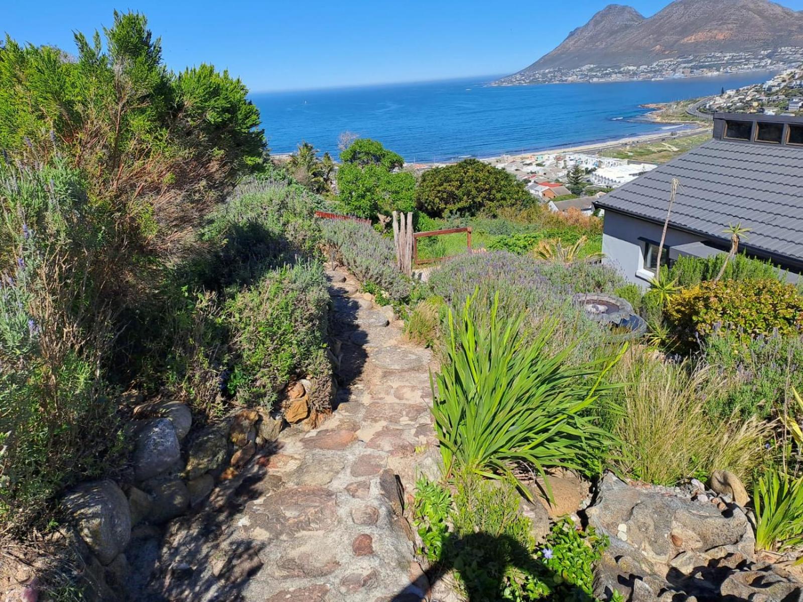 Modern mountainside home with ocean view - Minimal load shedding