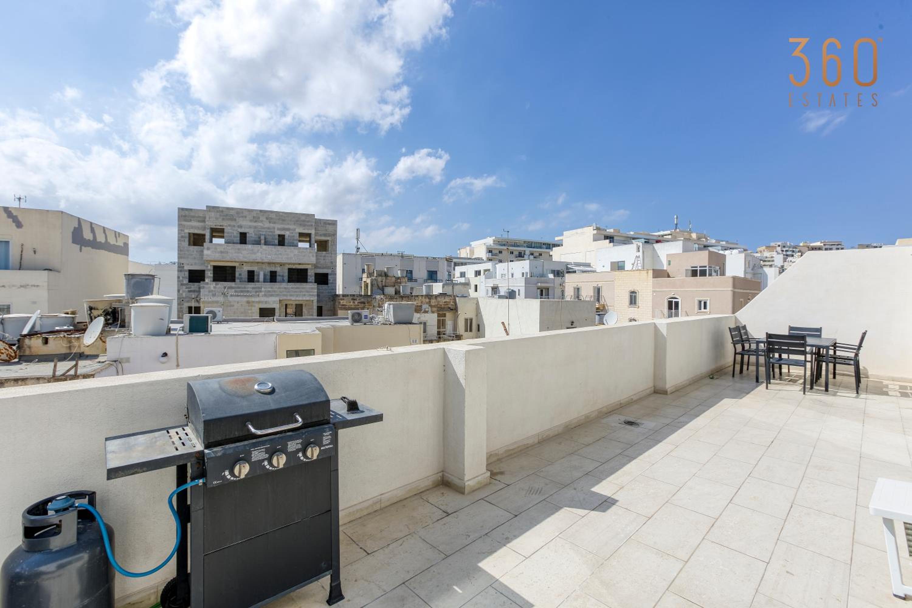 BBQ area, 2BR penthouse with large spaces & WIFI by 360 Estates view 4