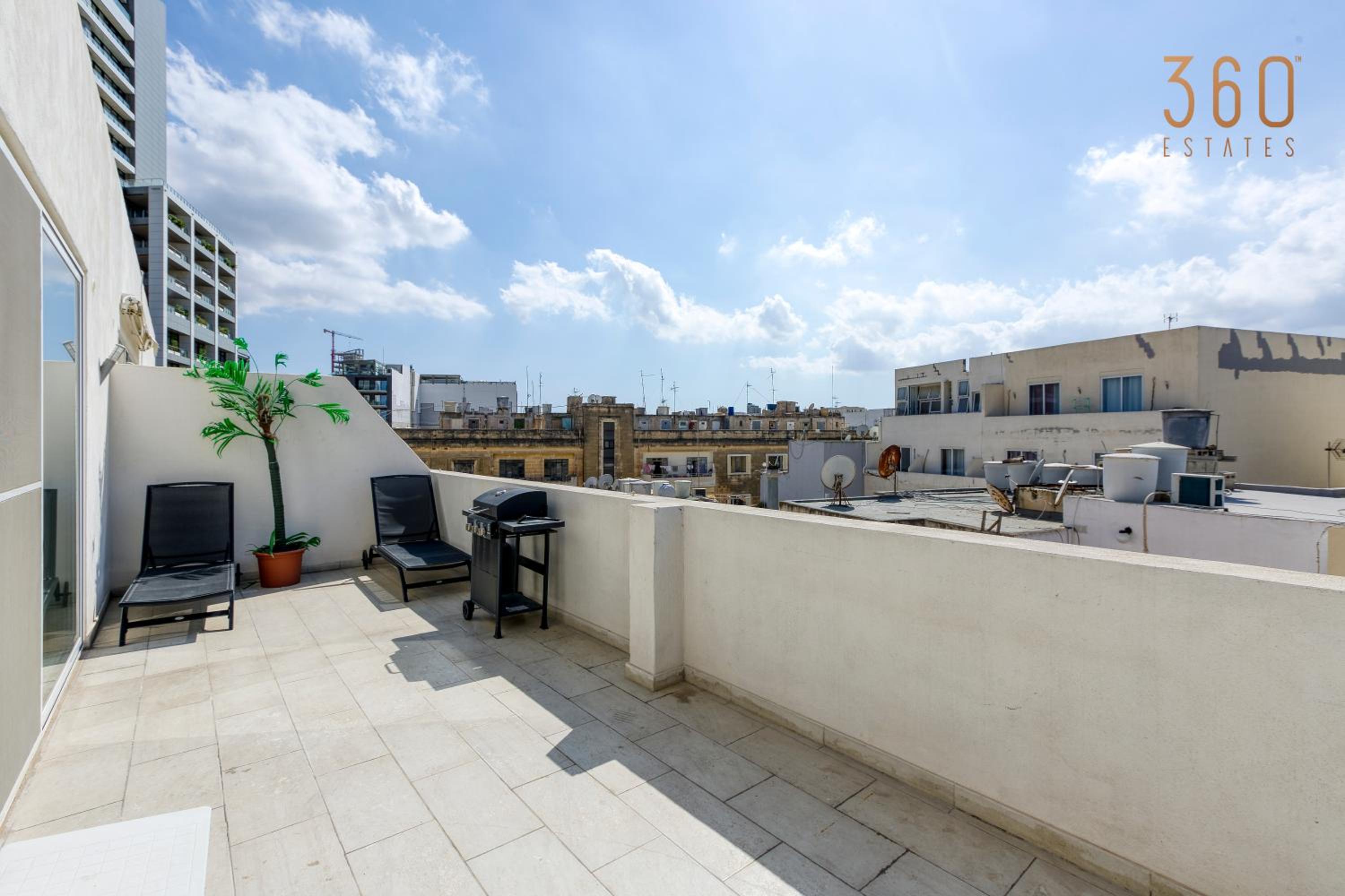 BBQ area, 2BR penthouse with large spaces & WIFI by 360 Estates view 5