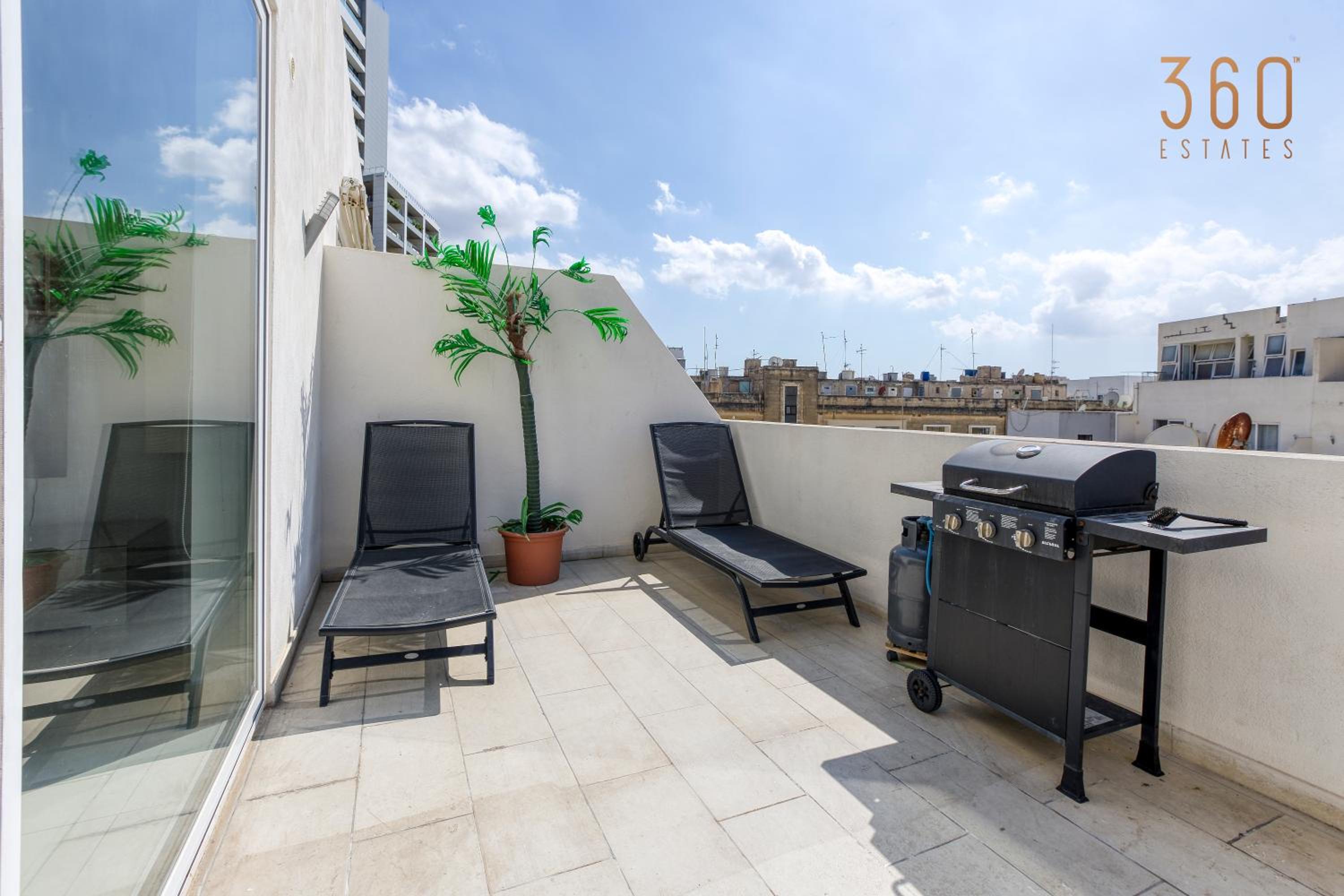 BBQ area, 2BR penthouse with large spaces & WIFI by 360 Estates view 2