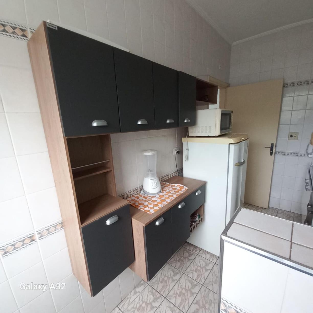 Apartamento com piscina 1 quarto de até 6 pessoas - Guarujá com Maquina Lavar Roupa