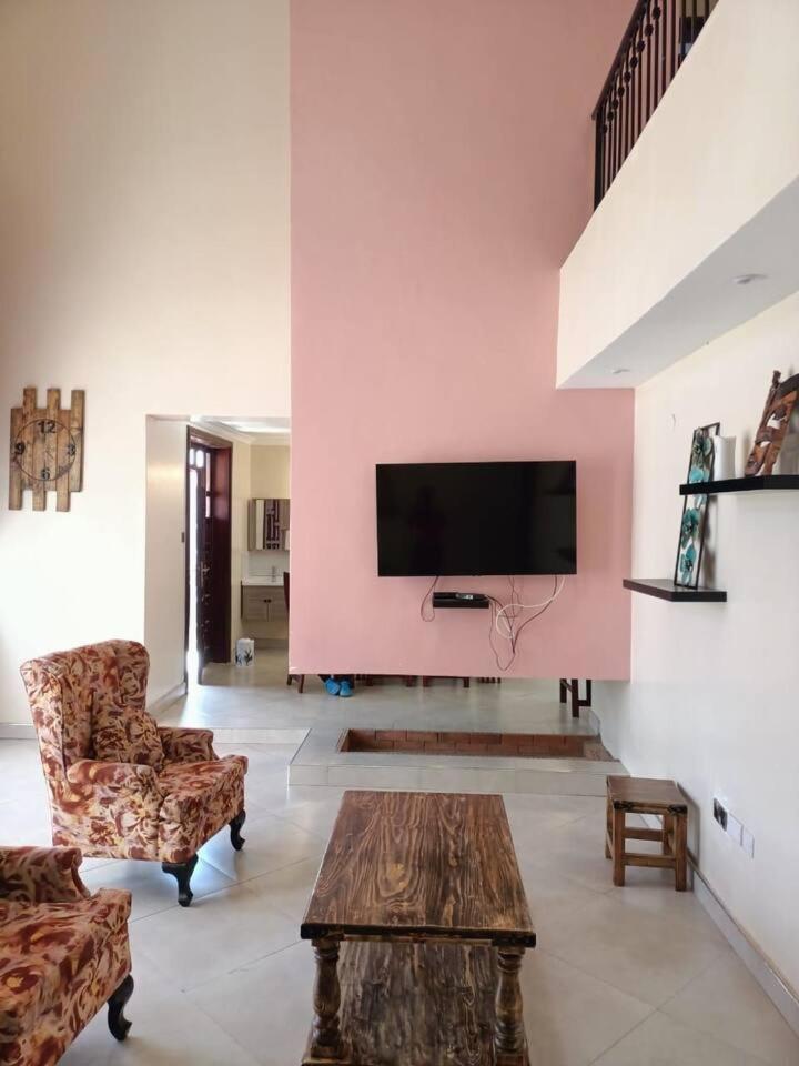 Exquisite 4 bedroom mansionette with a beautiful view-pink house