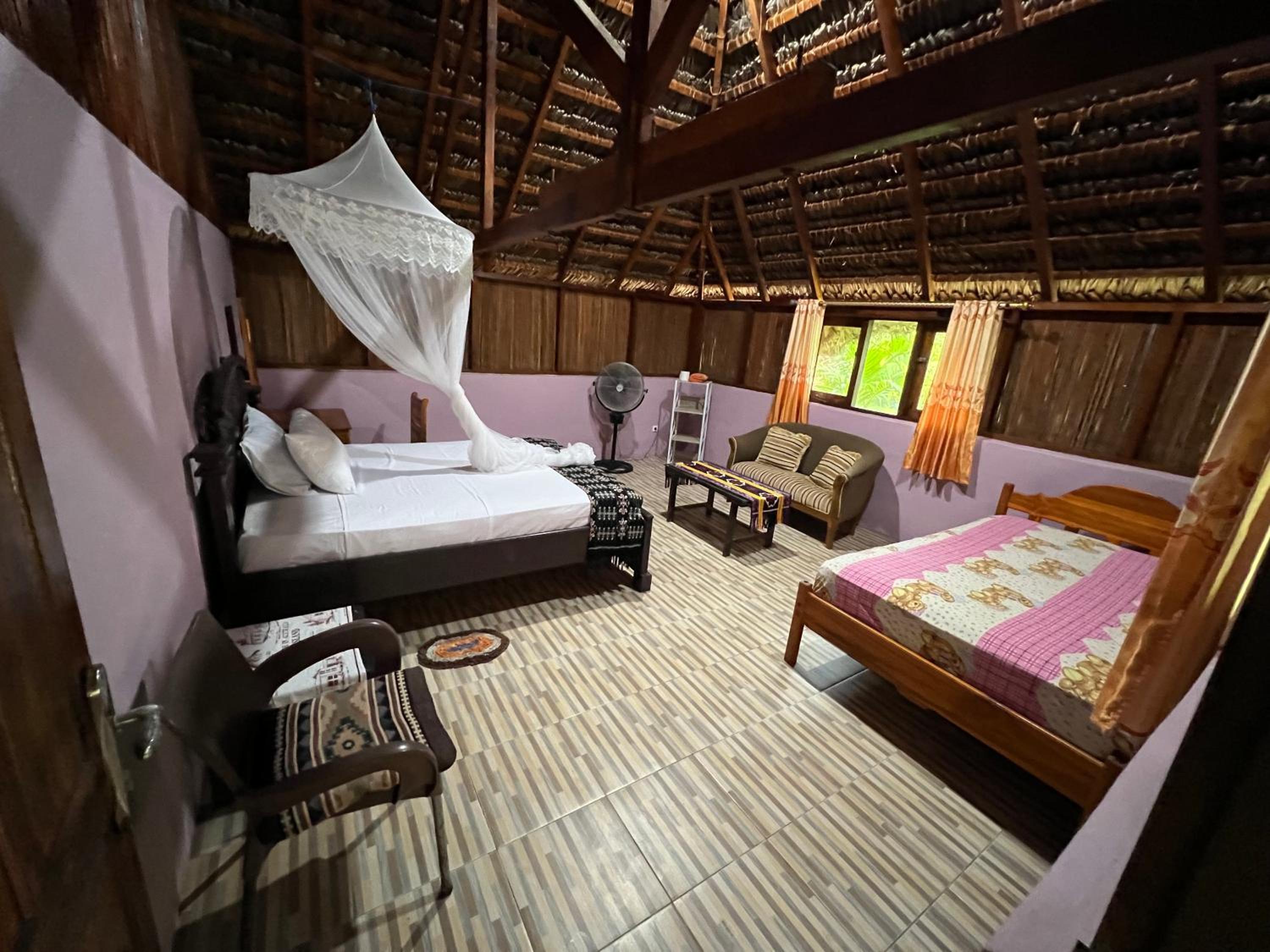 Rote Surf Resort - Lualemba Bungalows view 4
