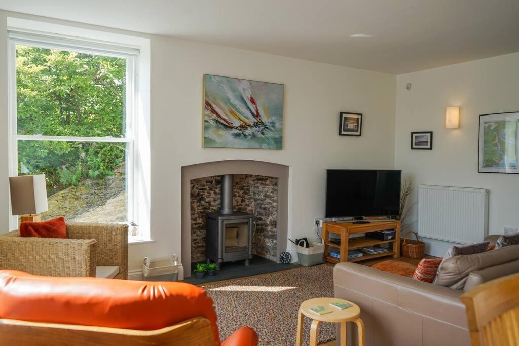 Riverside Apartment with Stunning Views & Patio