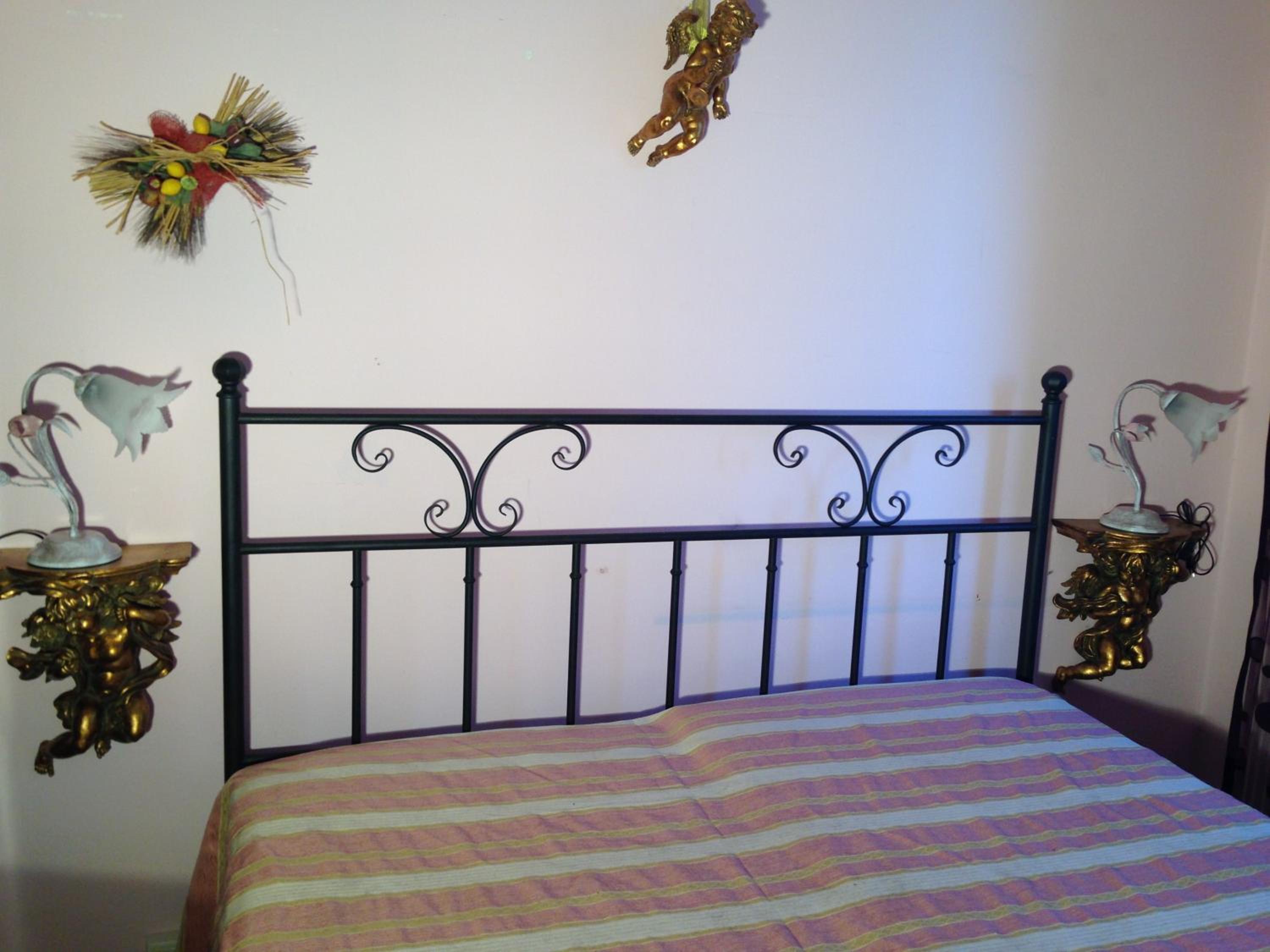 Stanza Bellaria en Pontedera — bedroom