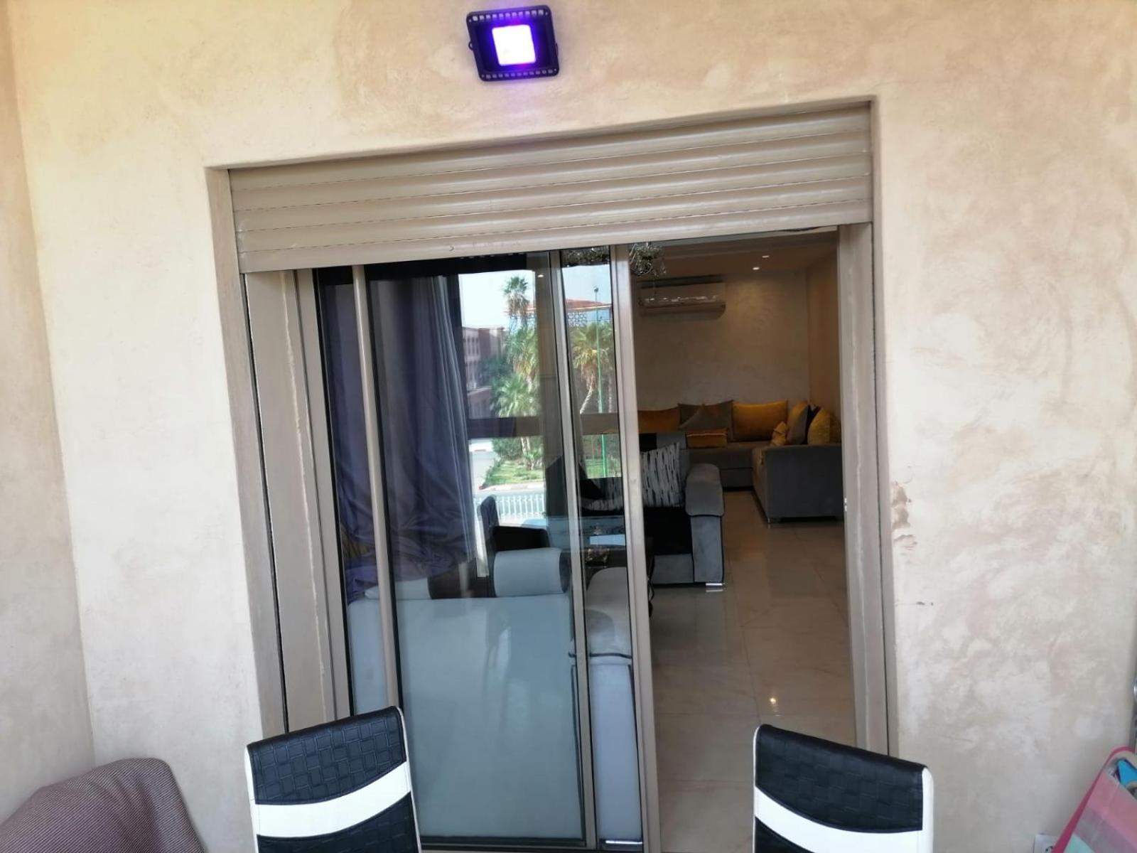 An elegant apartment for rent with a pool and a view of the mountains in Marrakesh
