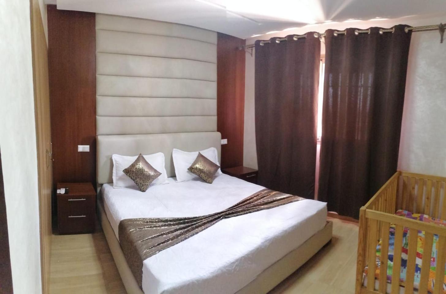 An elegant apartment for rent with a pool and a view of the mountains in Marrakesh