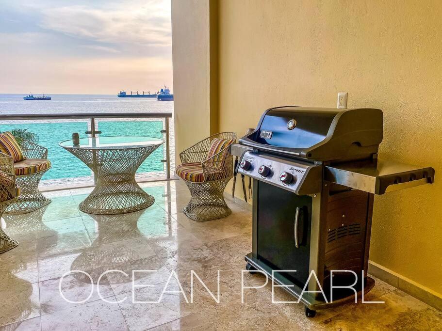 The Ocean Pearl Beachfront Infinity Pool Gym BBQ view 3