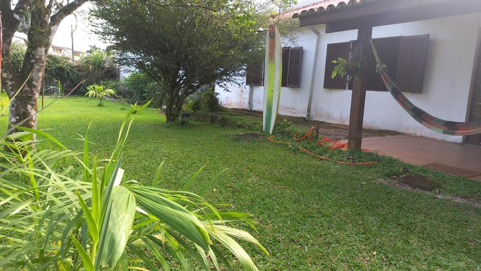 Casa na praia com pomar