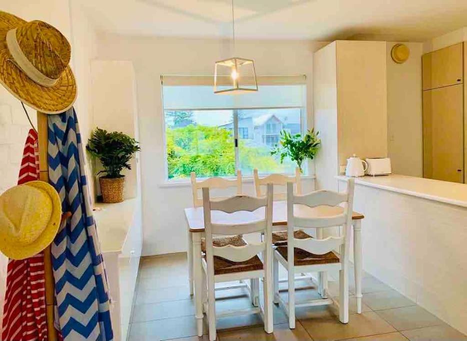Beautiful, modern apartment seconds from beach