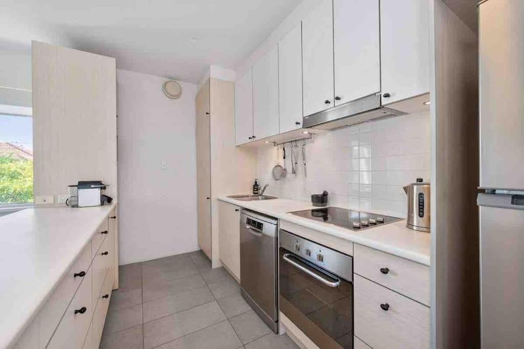 Beautiful, modern apartment seconds from beach