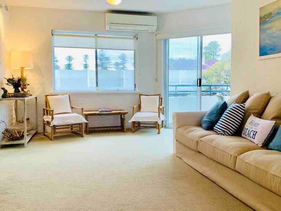 Beautiful, modern apartment seconds from beach