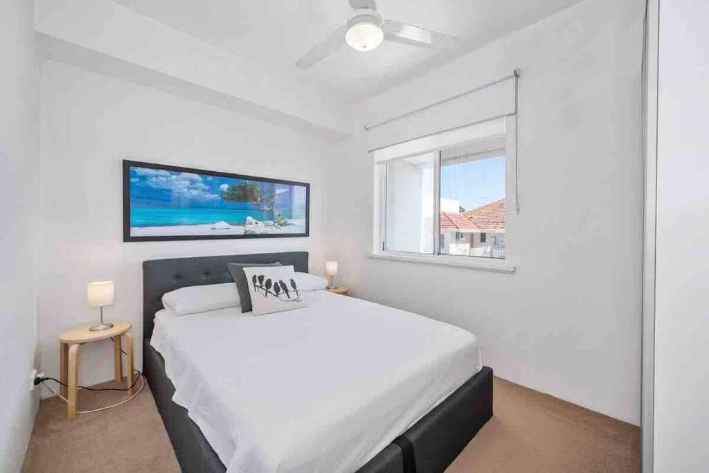 Beautiful, modern apartment seconds from beach