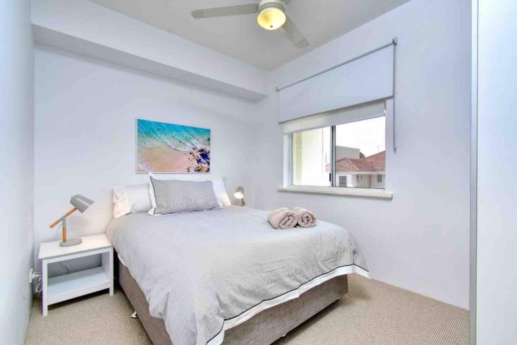 Beautiful, modern apartment seconds from beach