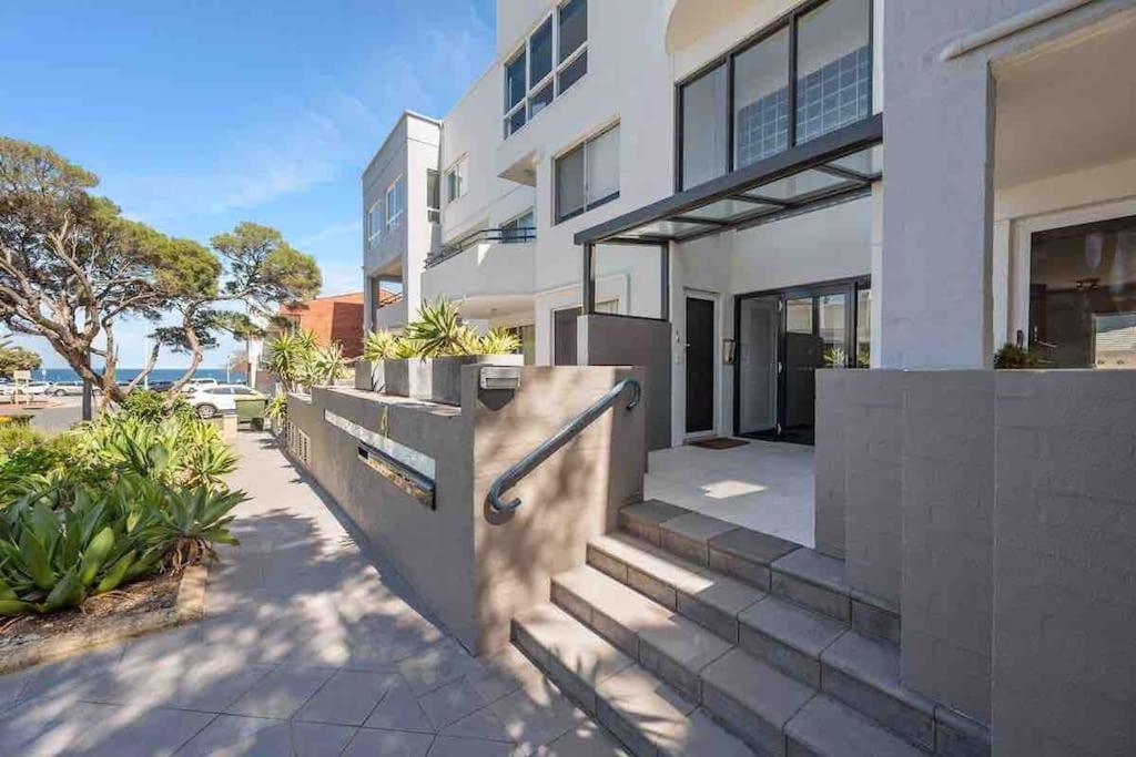 Beautiful, modern apartment seconds from beach