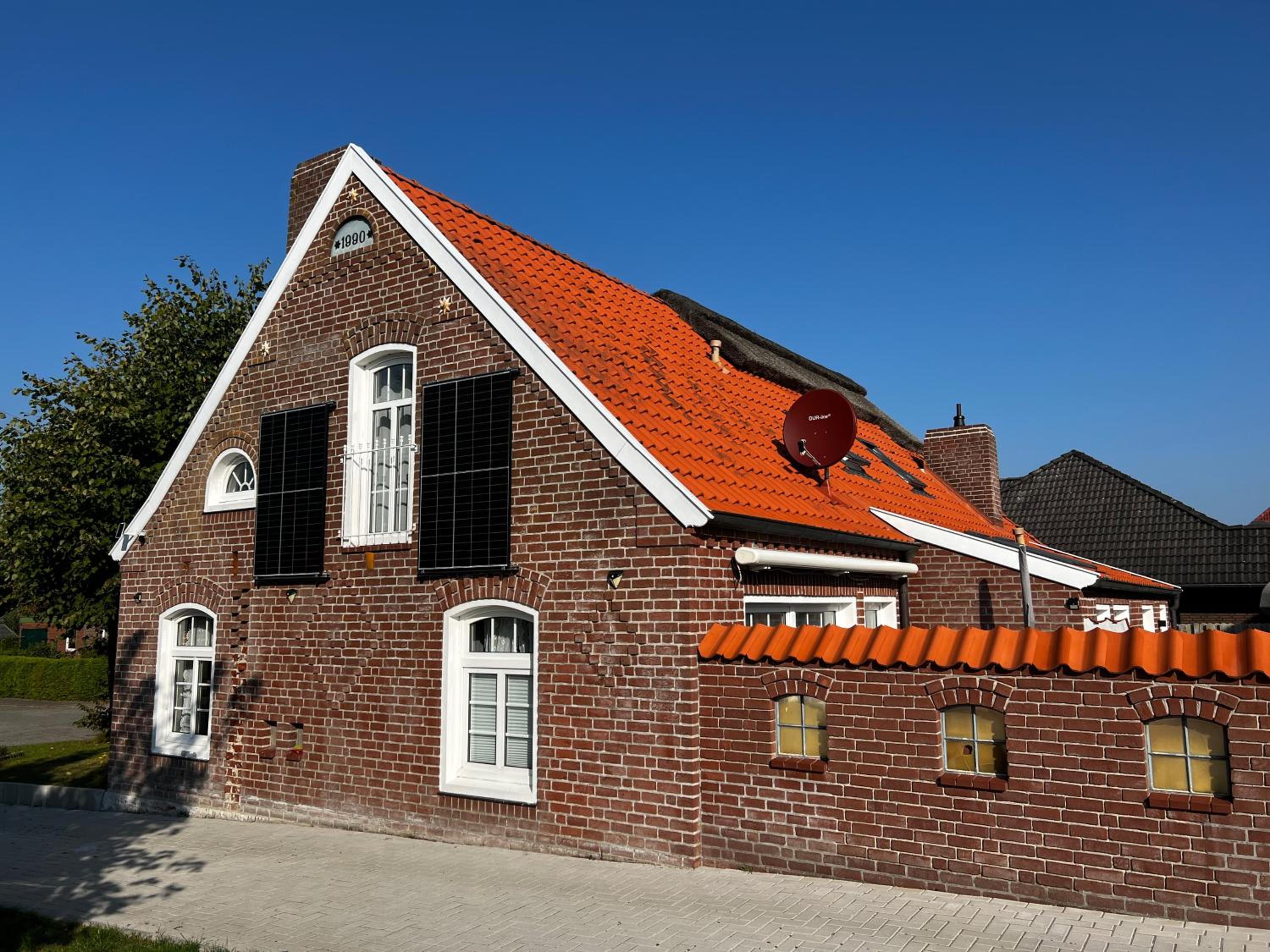 Lindenhuus-Urlaub unter einem Teilreetdach-Terrasse - Nahe Norden-Norddeich