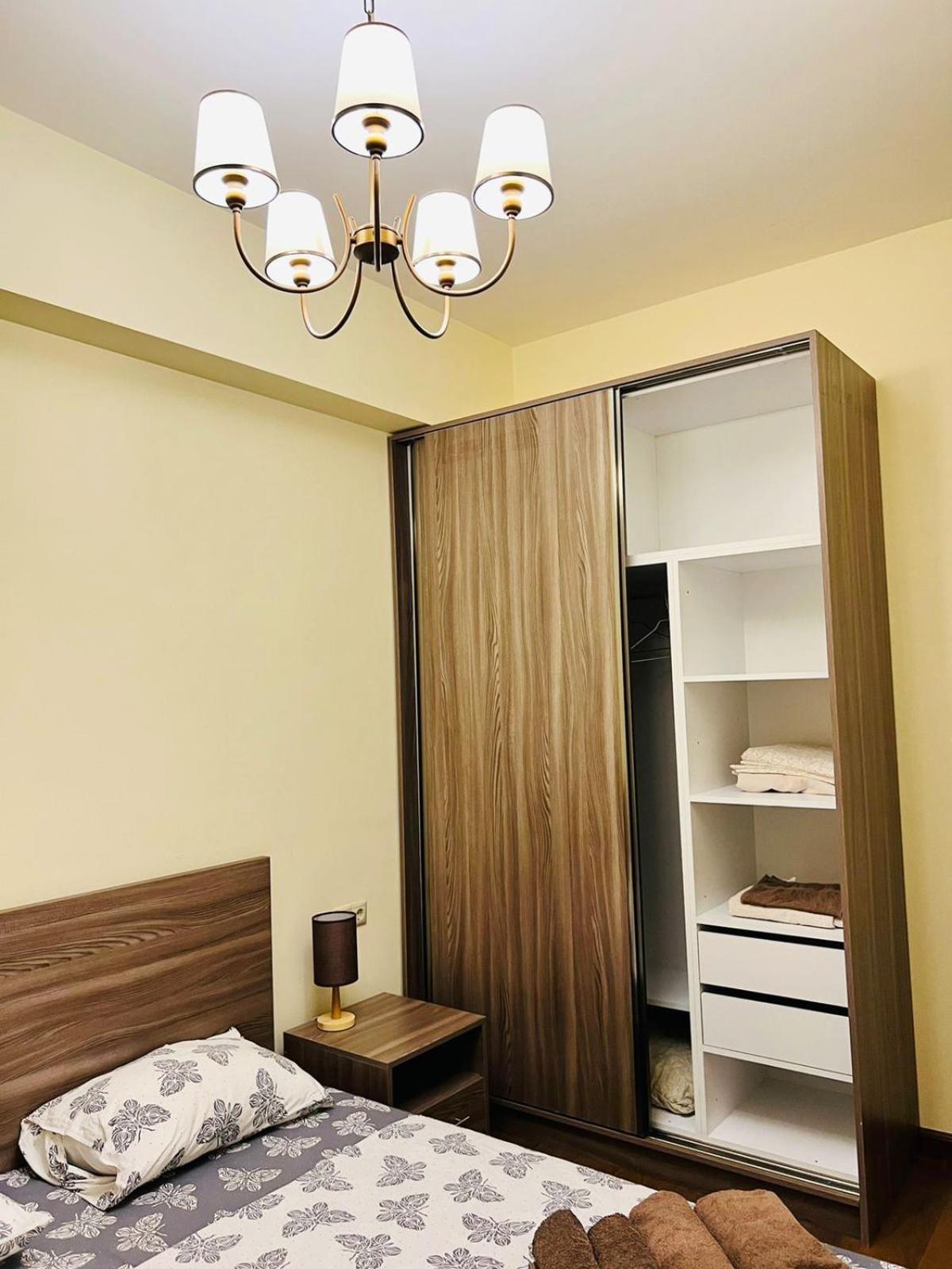 Modern Apartment +Balcony next to Republic Square, City Center