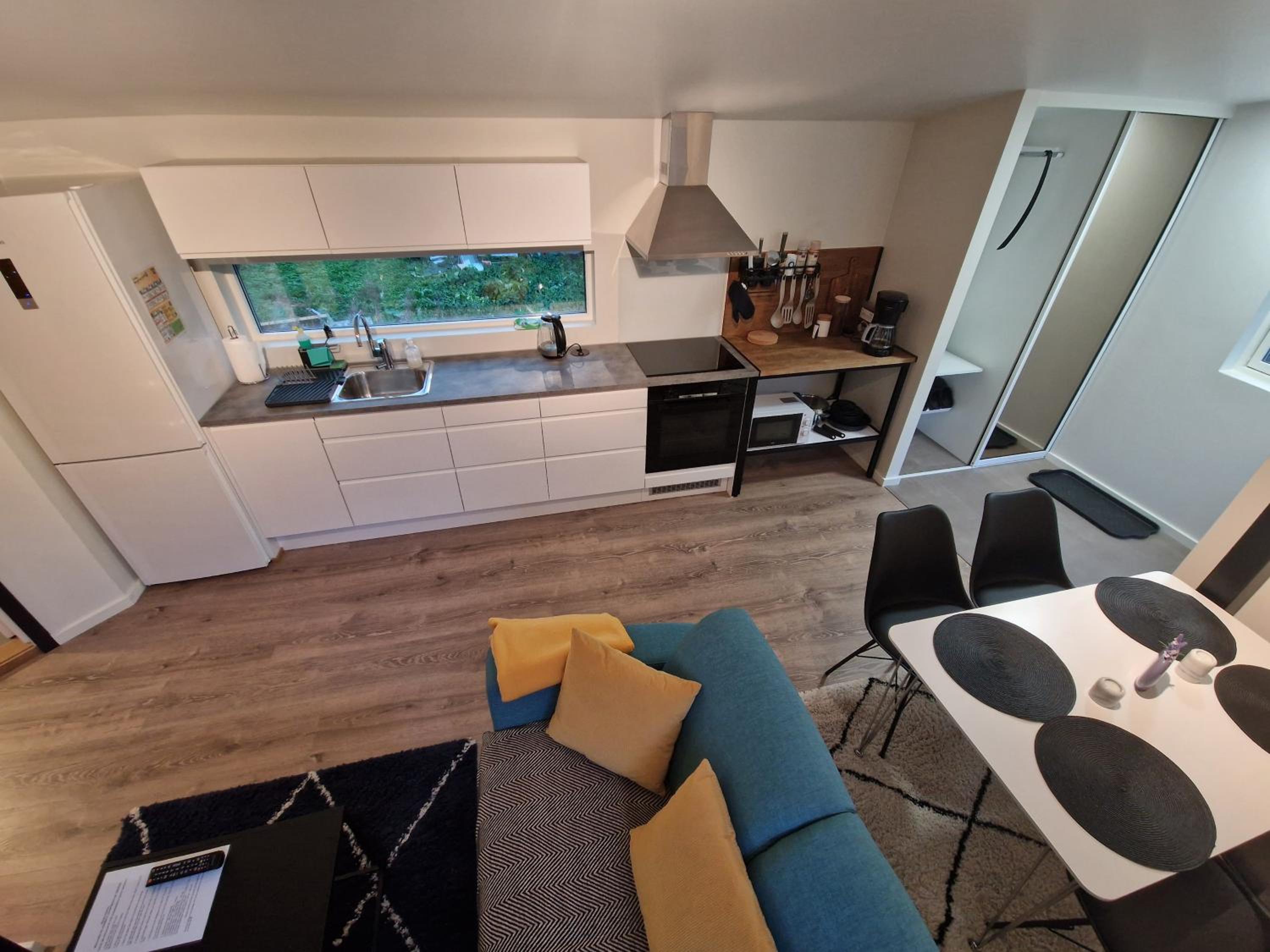 Northern living 1 room with shared bathroom