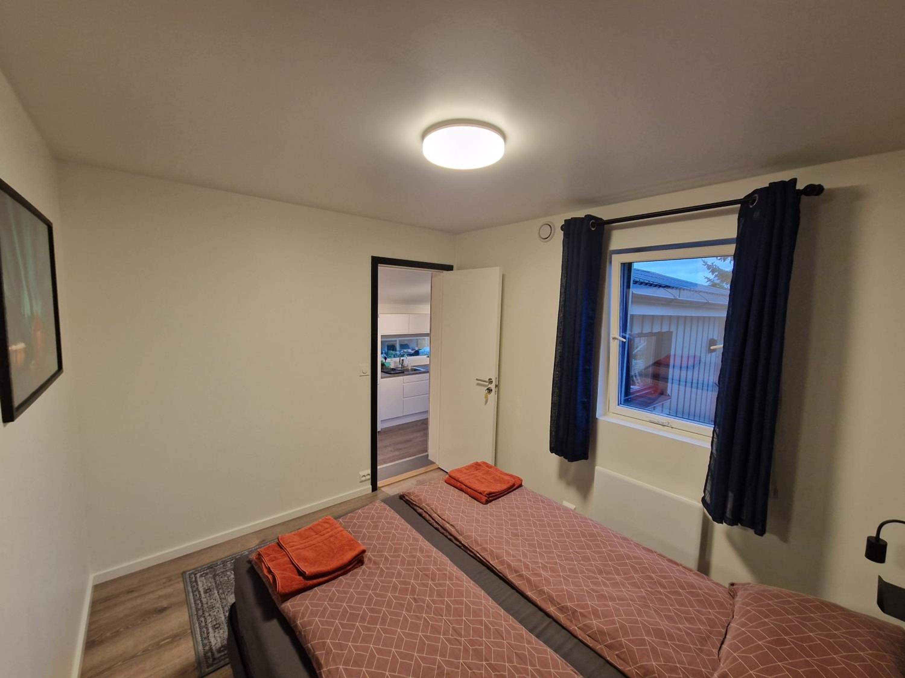 Northern living 1 room with shared bathroom