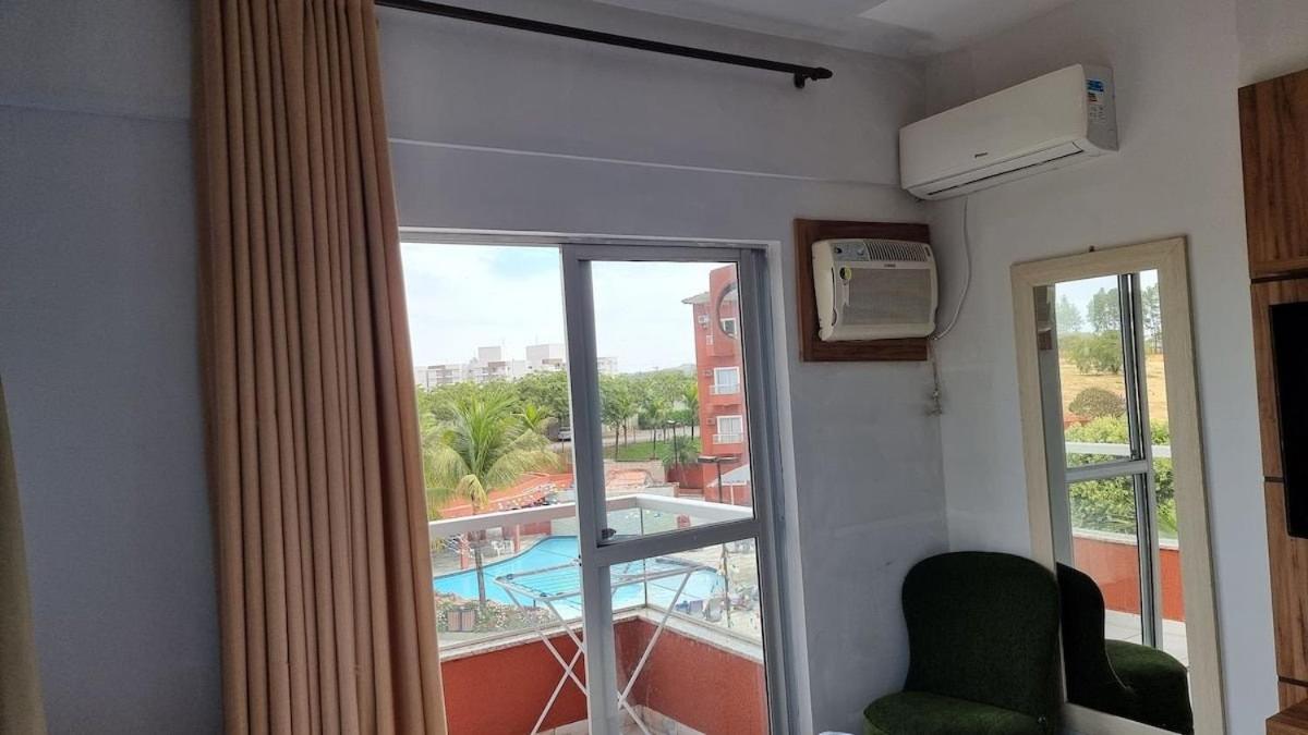 PARQUE AQUÁTICO Lagoa Quente, à 50m, entrada + barata .Segurança 24h.Apto vista piscinas
