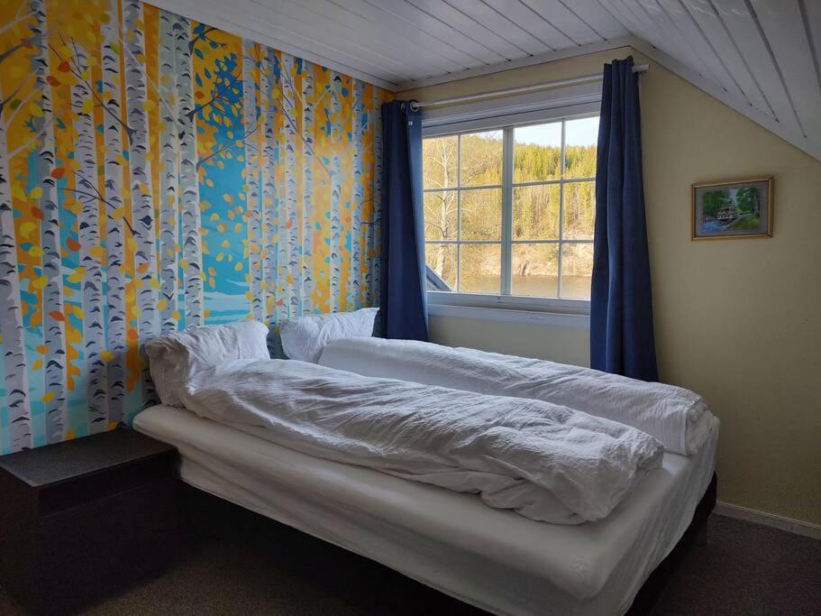 Hus i Telemarkskanalens hjerte
